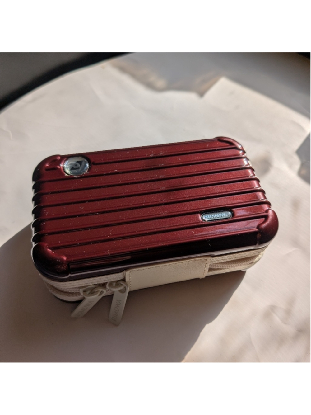 Rimowa Mini Hard Shell Case in Metallic Burgundy